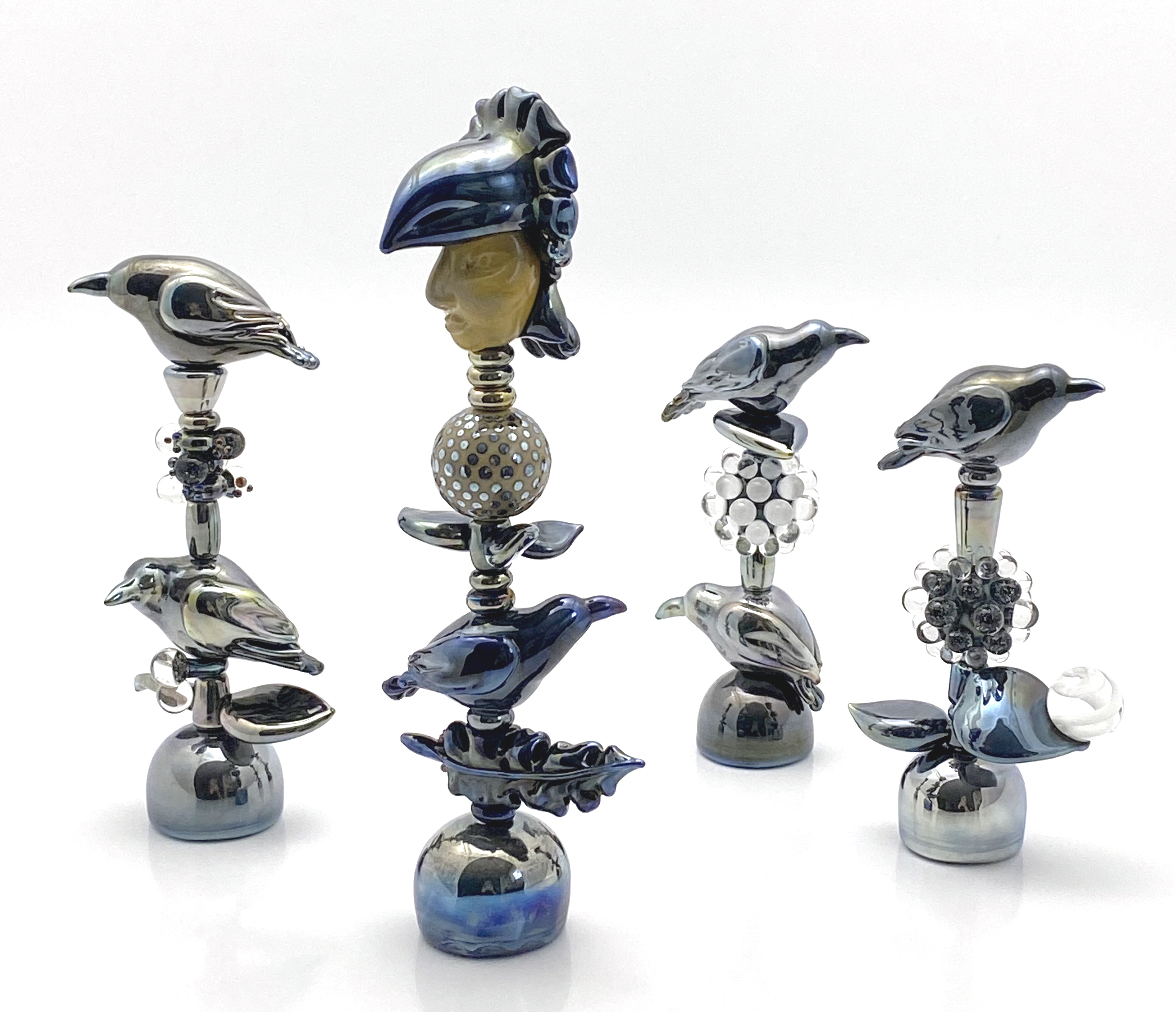 Sculptural Art Totems created by Liliana Glenn, dedicated to the Corvus Species.
