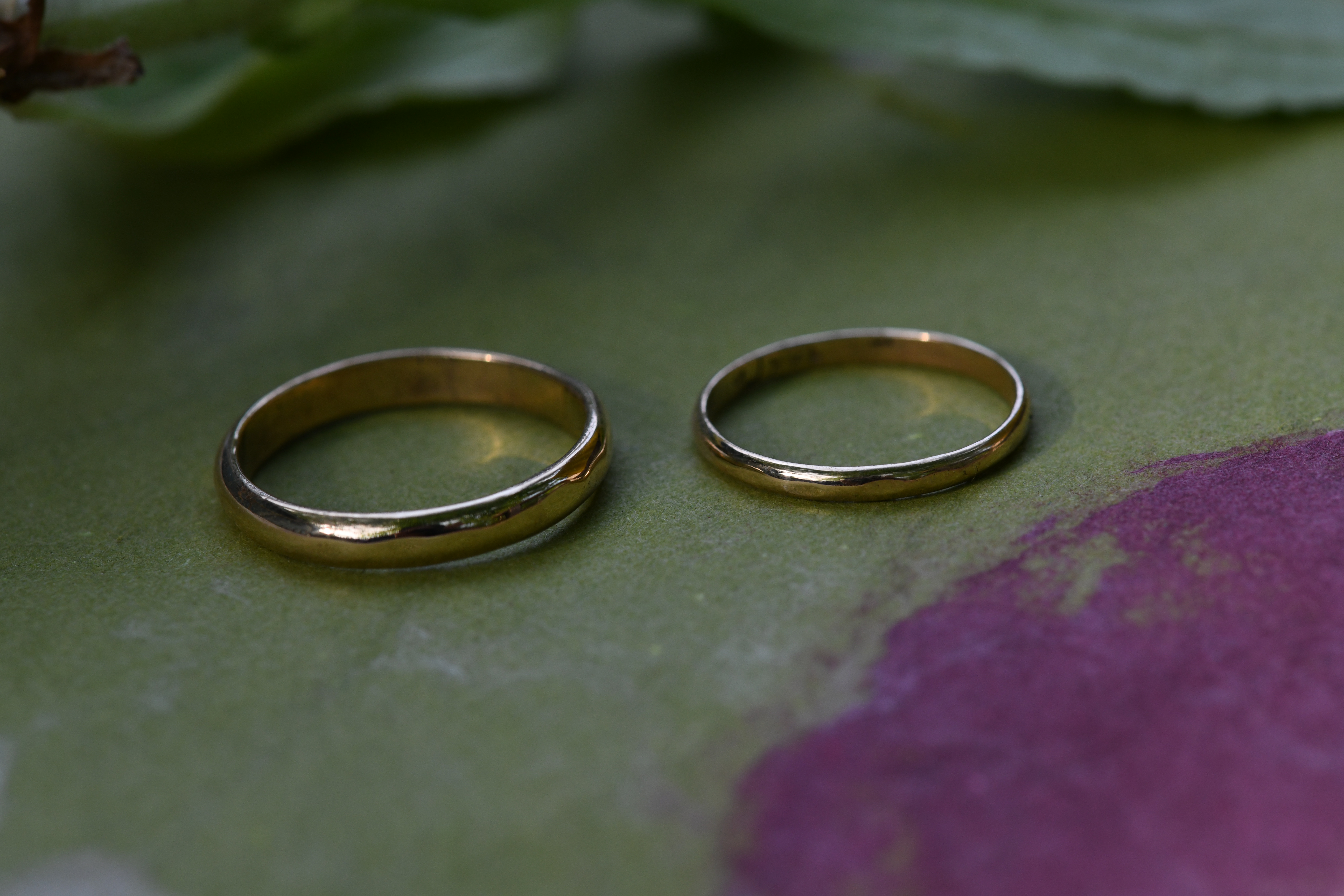 Two half round gold bands, his and hers 14k gold wedding rings