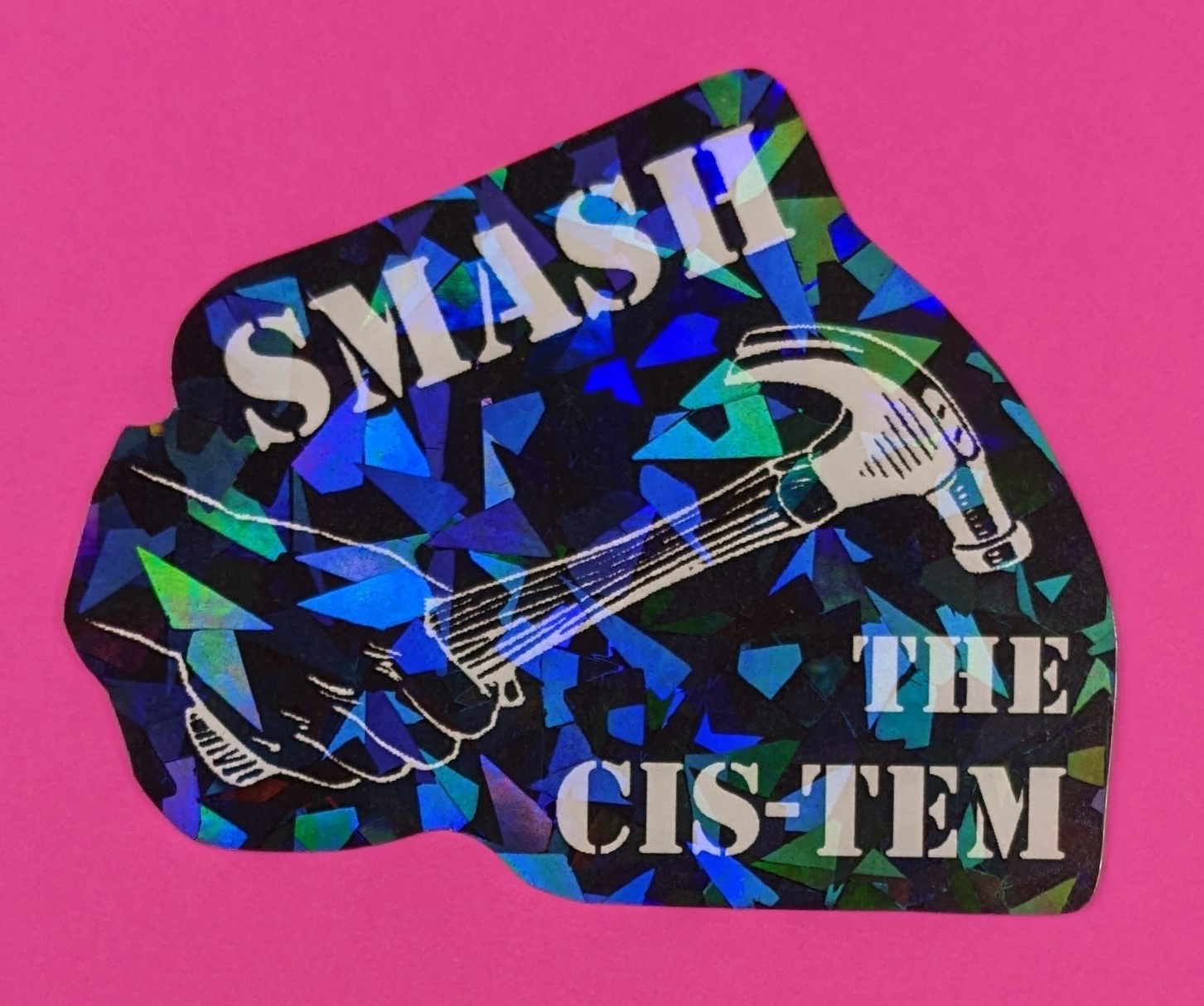 sticker with hand holding hammer and the text 'smash the cis-tem'