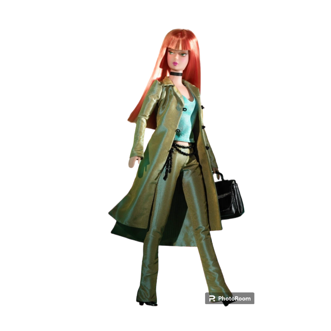 Producer Barbie doll wearing a green suit and carrying a black handbag with red hair