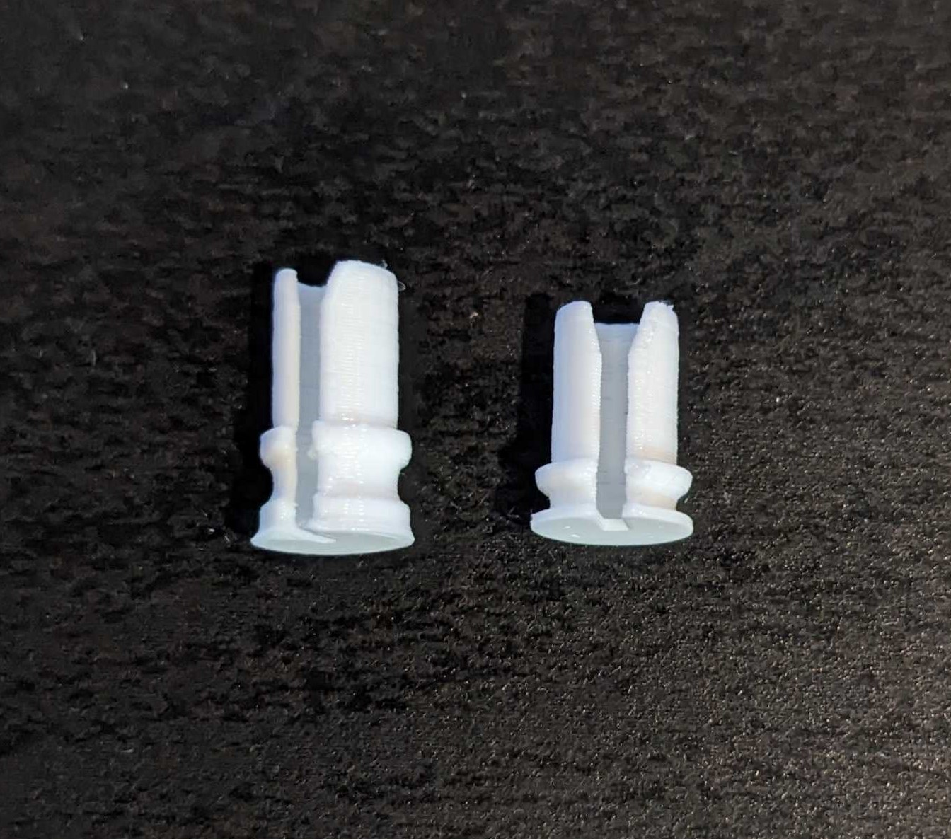 One long trigger plug and one short trigger plug