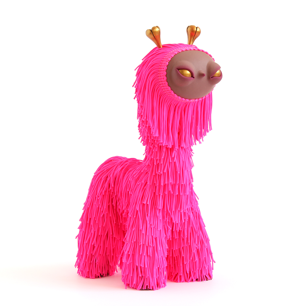 Neon pink polymer clay and fabric fringe creature sculpture
