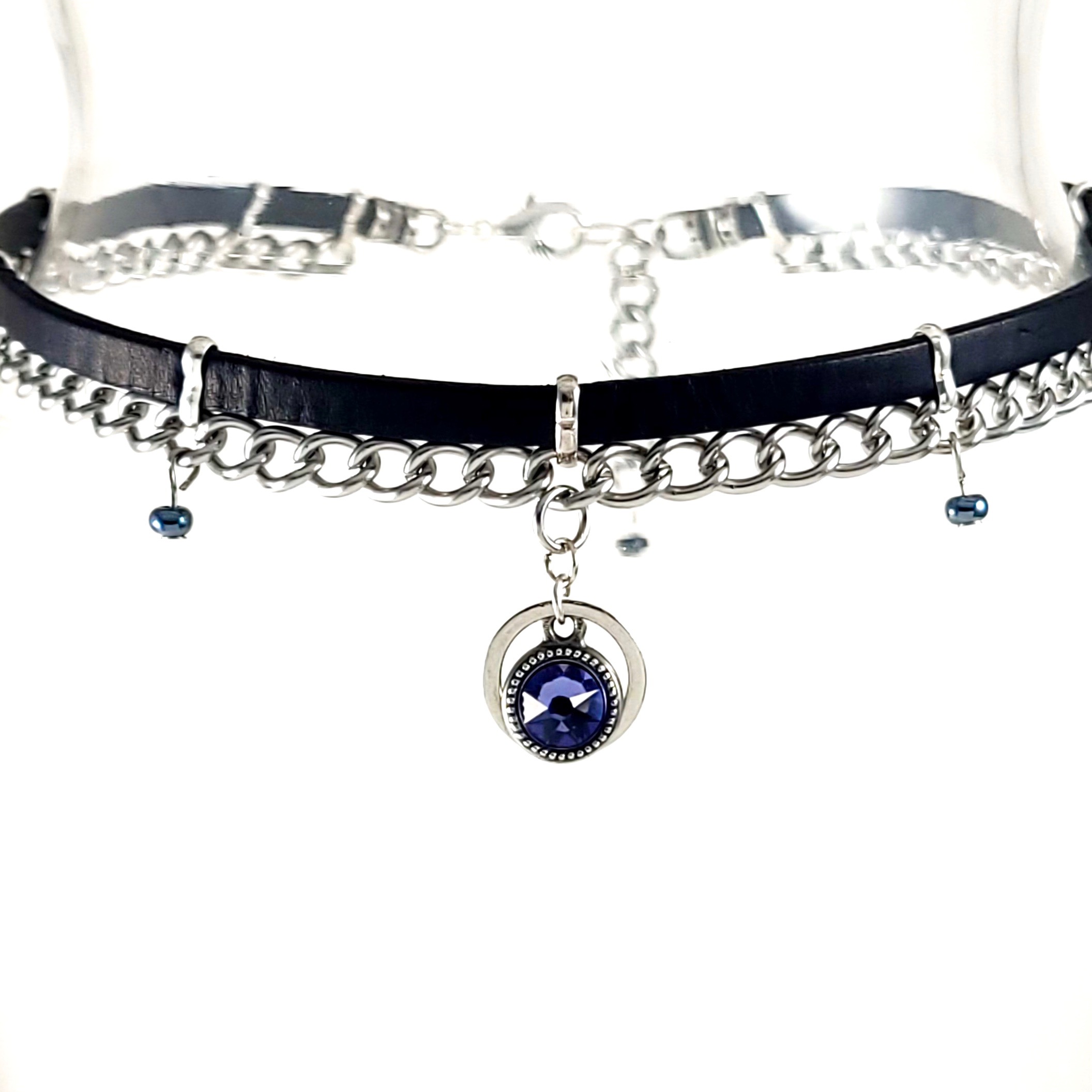 Black leather and silver curb chain choker, blue Swarovski charm.