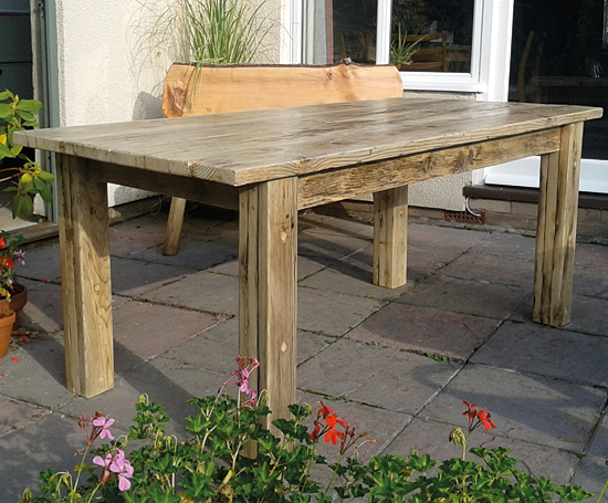 Reclaimed wood table in a garden