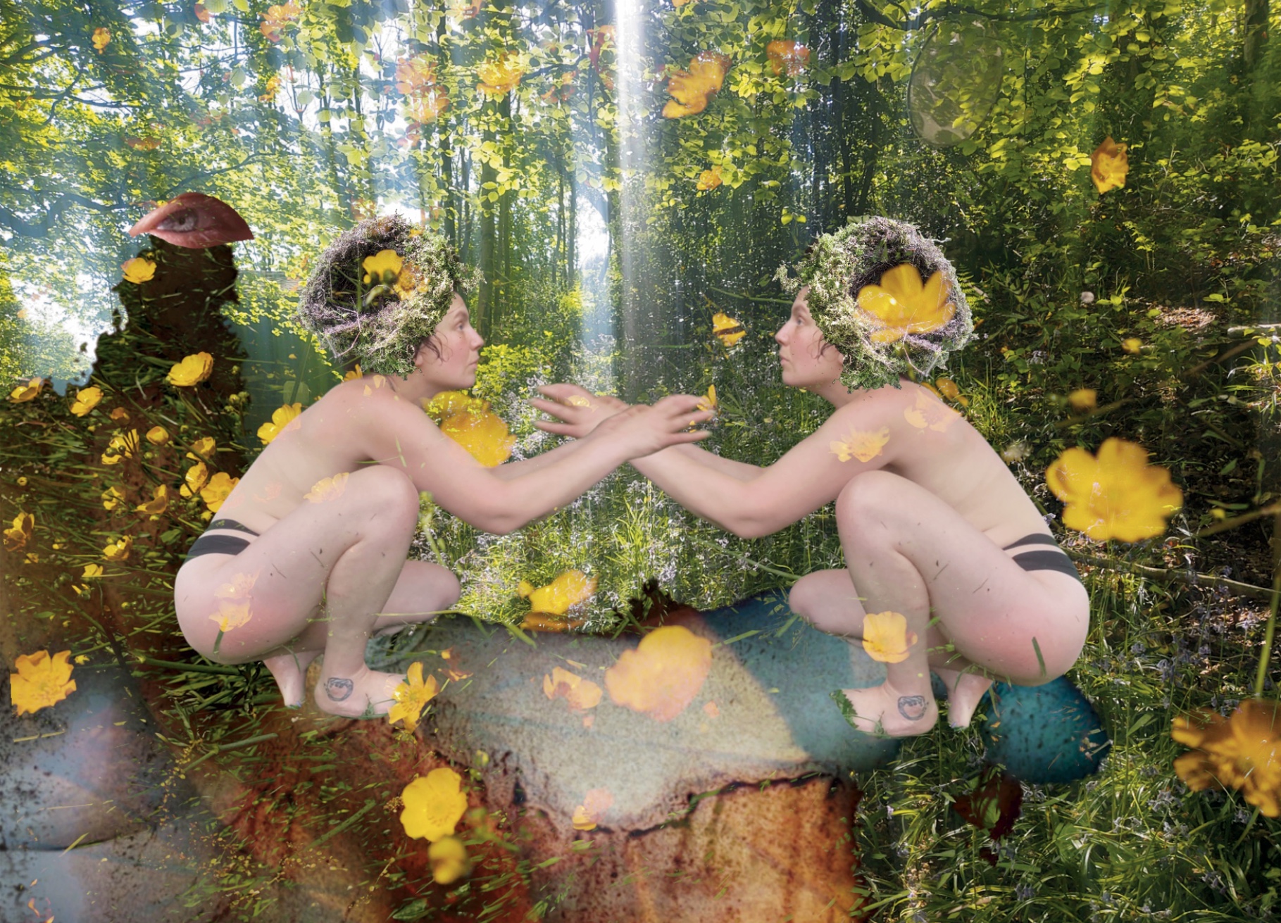 Artist almost naked crouched and seeing her mirror self amongst buttercups