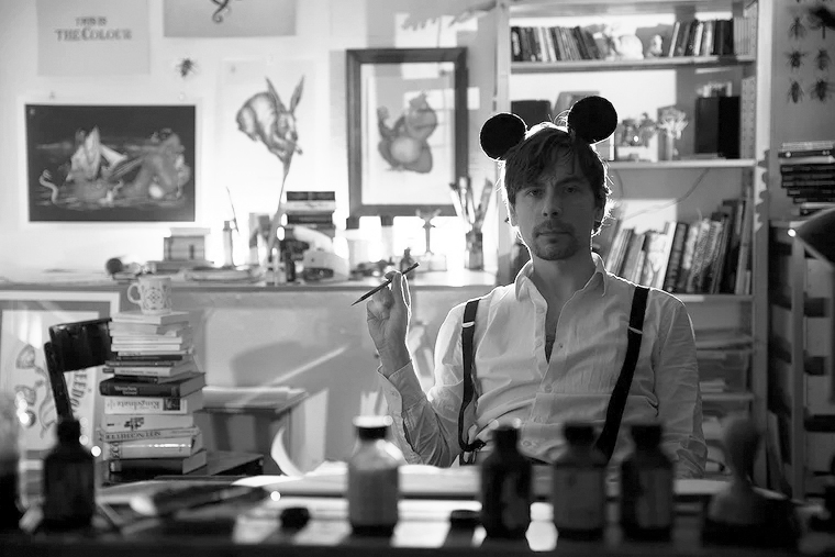 Picture of Comic Artist Andreas Hartung in his studio.