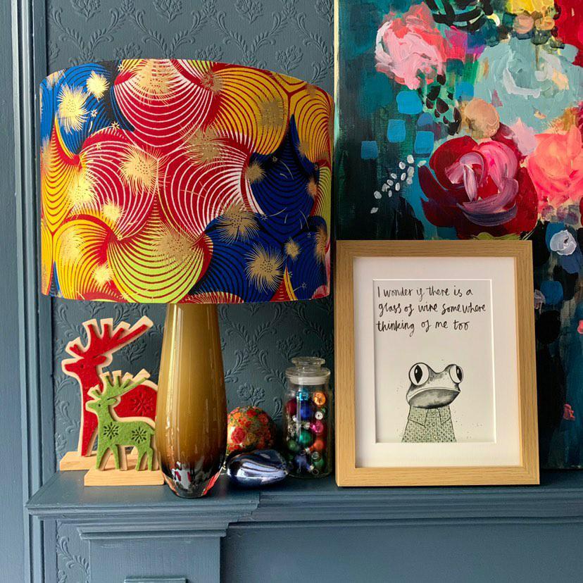 Colourful handmade African Lampshade with floral painting & illustrated print photo shoot. Collaboration between Detola and Geek & Tipperlilly Hill