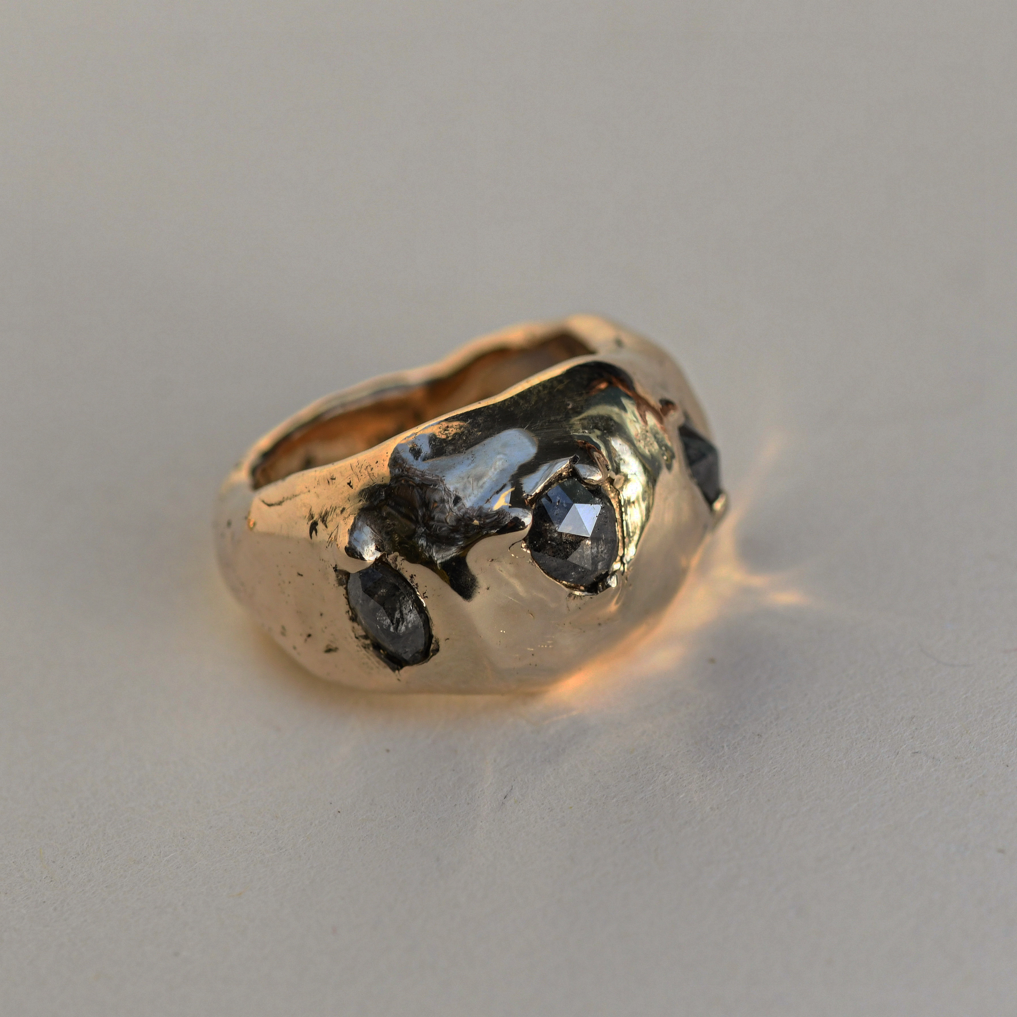 14K chunky gold ring with 3 rose cut salt and pepper diamonds