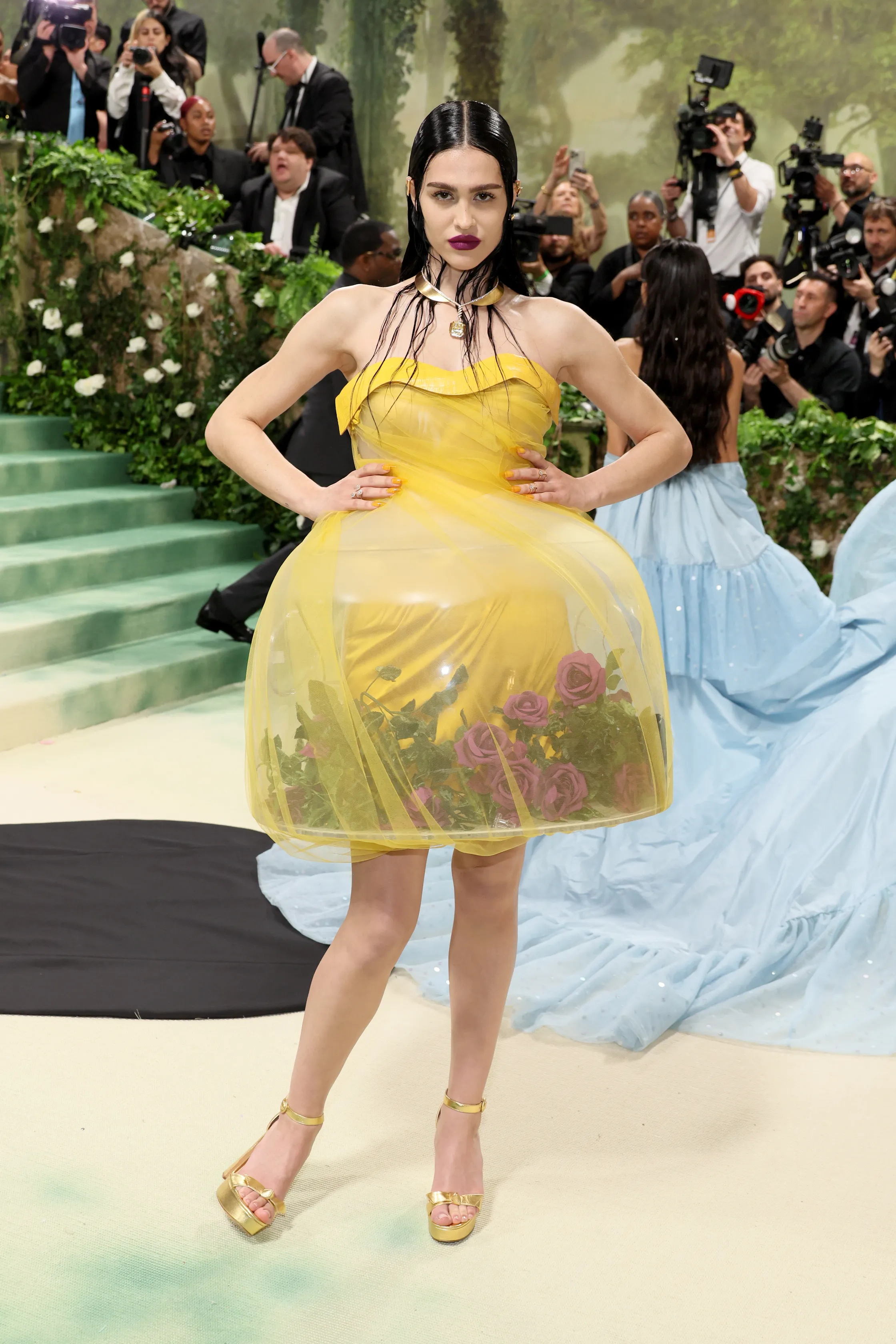 Amelia Gray Hamlin wearing a yellow terrarium style dress