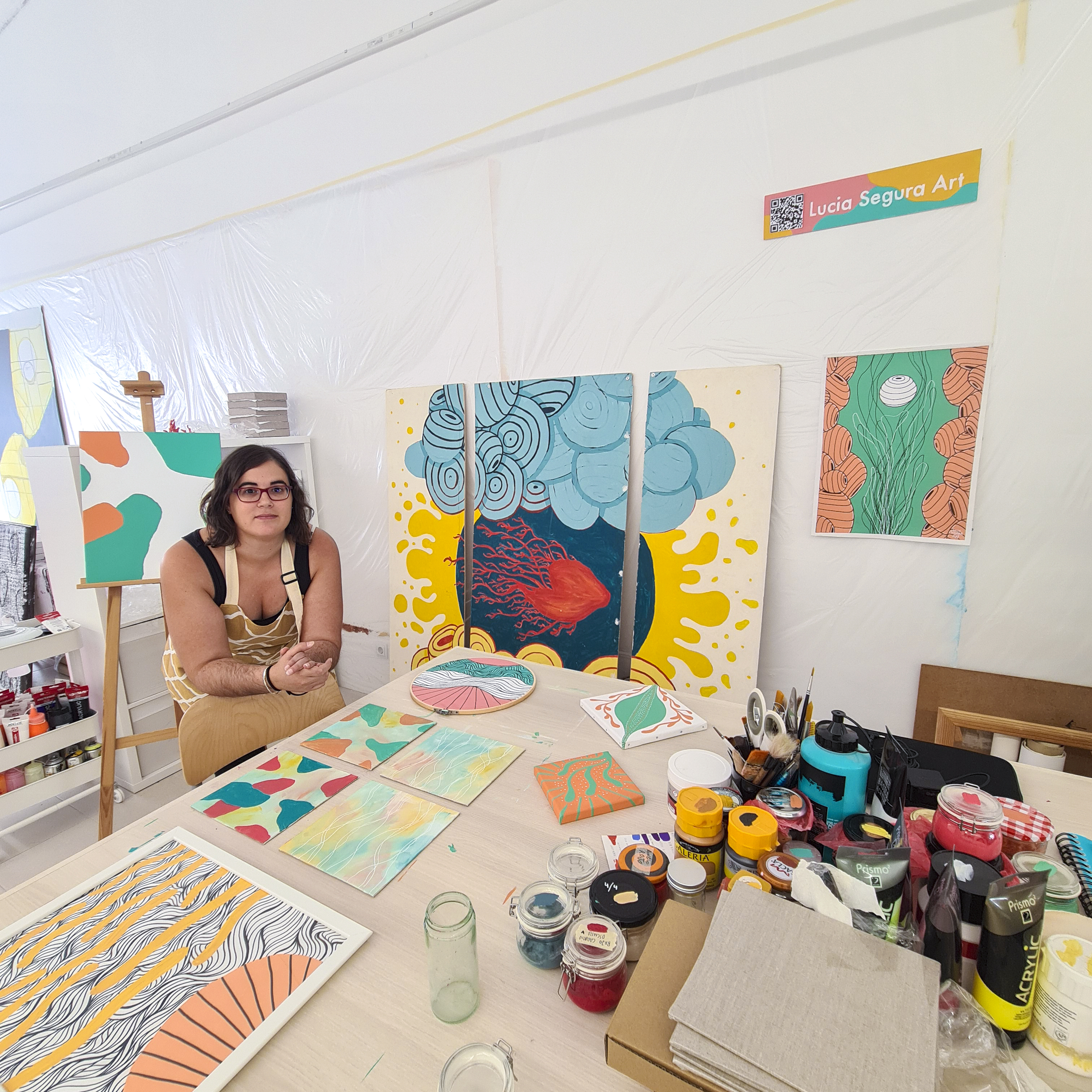 Lucia Segura Art at her studio with her artworks WIP