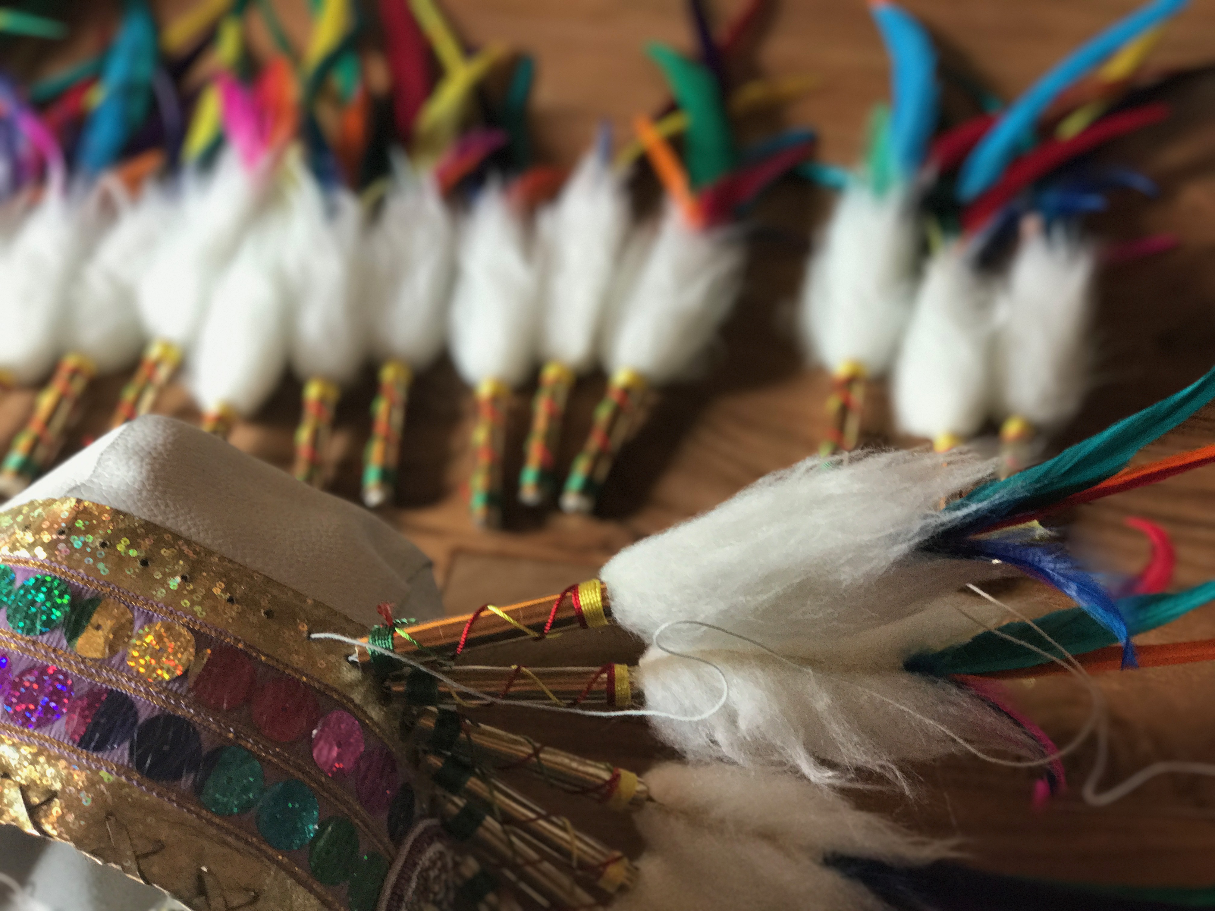 rainbow feather headdress in the making