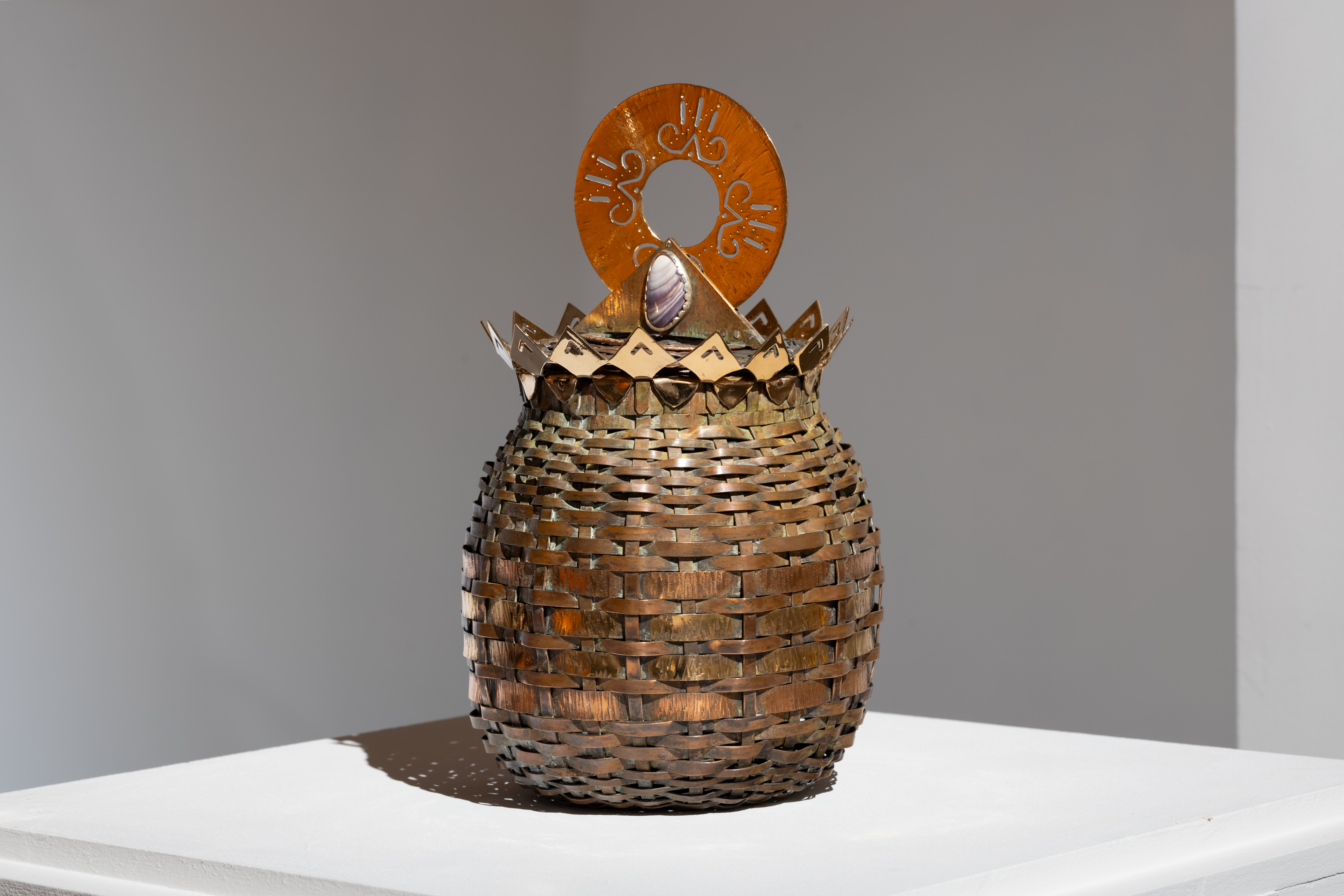 Metal basket-weaving piece created by Wolastoq artist Shane Perley-Dutcher