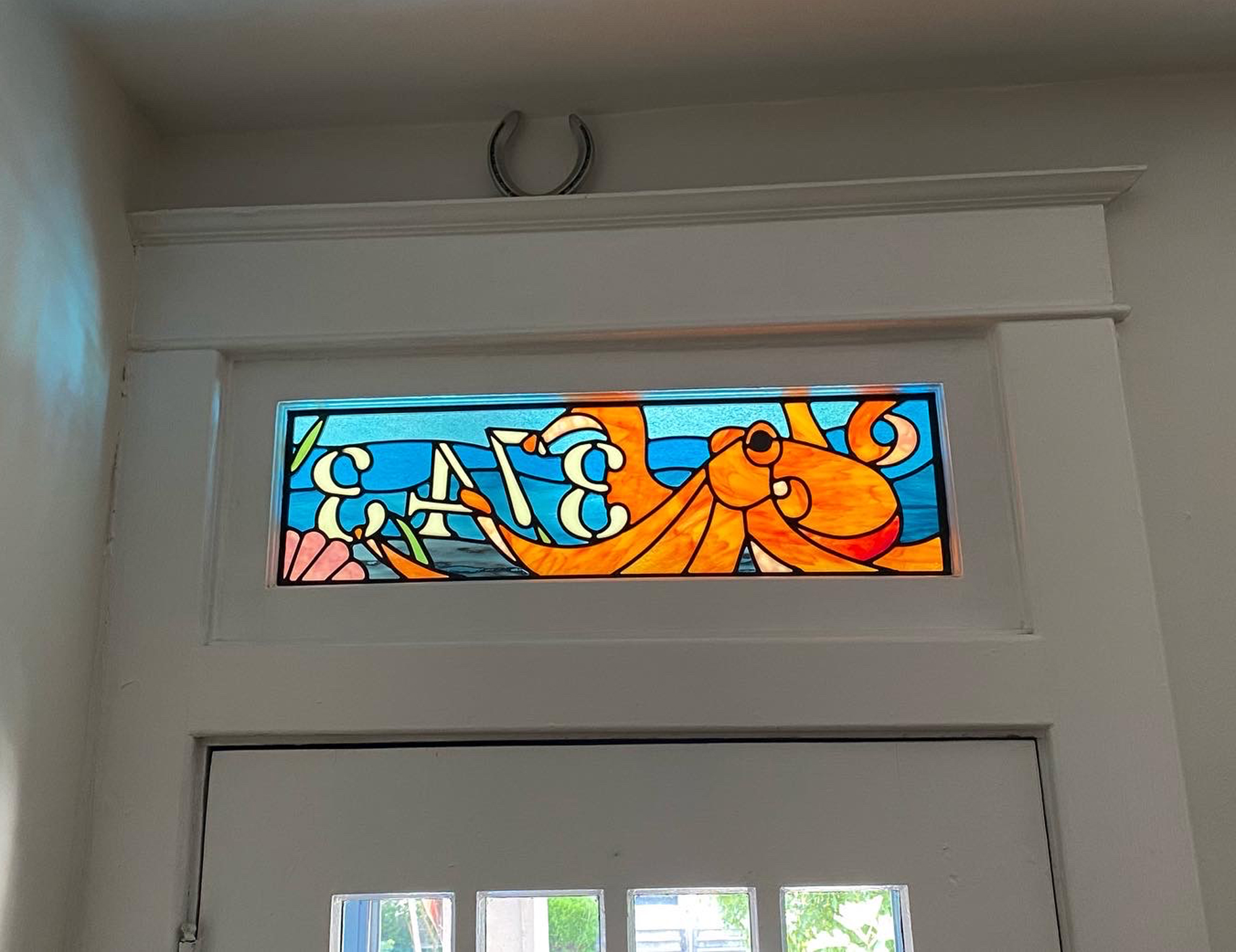 Stained glass transom with Octopus