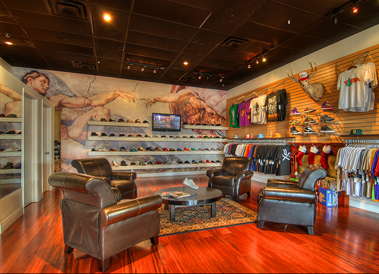 Retail Store design shoe wall area using multiple Art disciplines of graphic color layout, signage, buildout design and branding of products