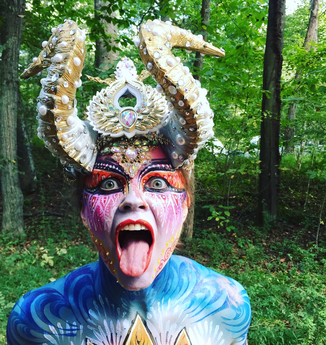 Anita, woman in body paint with horns