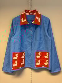 Image 1 of Blue shirt with cherry’s (s)