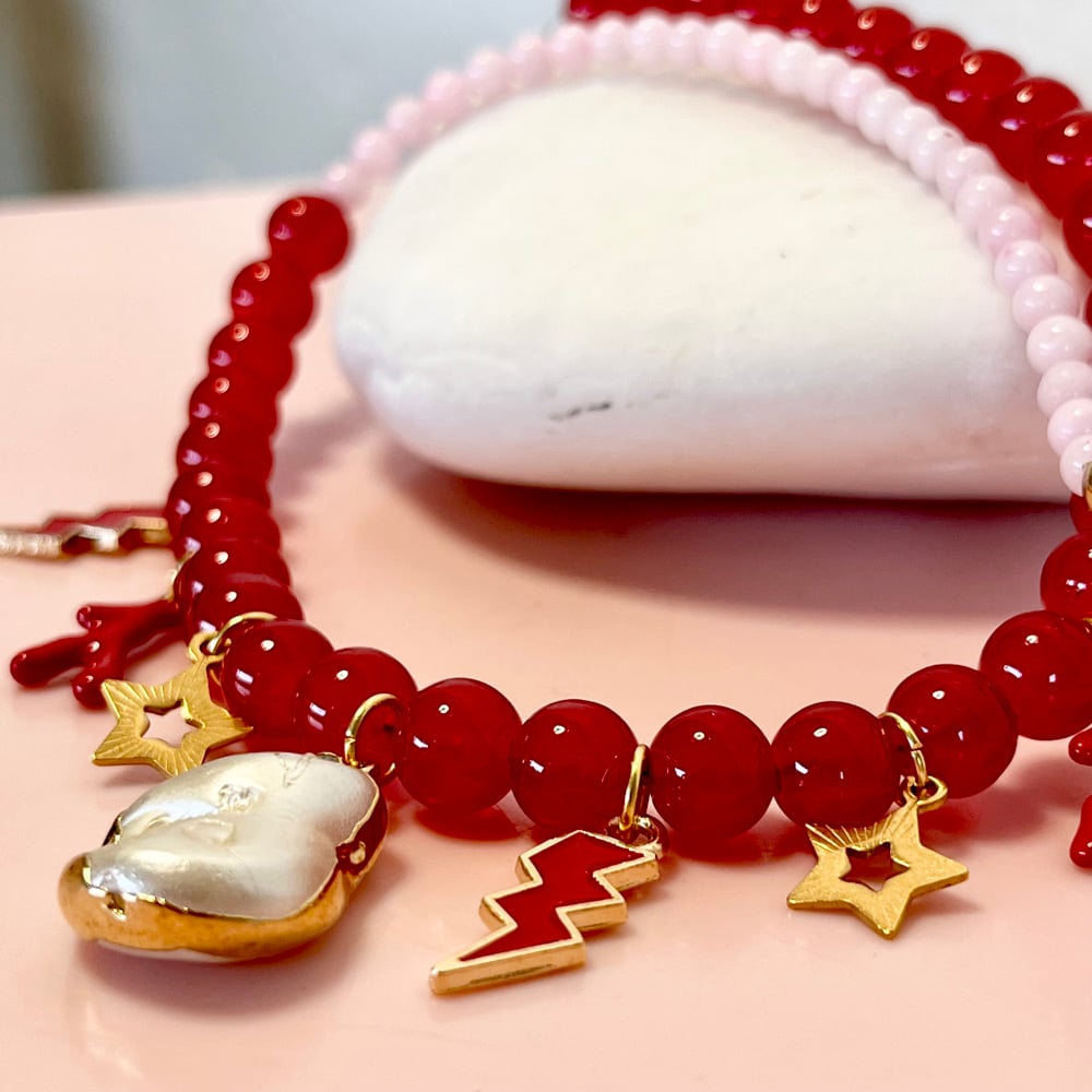 Image of Pink and Red glass bead necklace with pearl, lightning bolts and coral drops