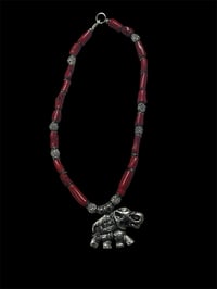 Image 1 of Tusks of Crimson