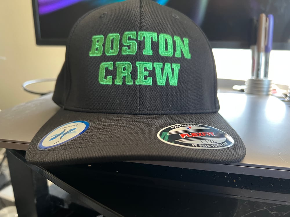 Black Flexfit hat with Green “Boston Crew" Logo