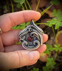 Image 1 of Garnet Center Wrapped in Sterling Silver