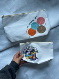 Image 2 of this is probably yarn // accessory pouch with t bottom