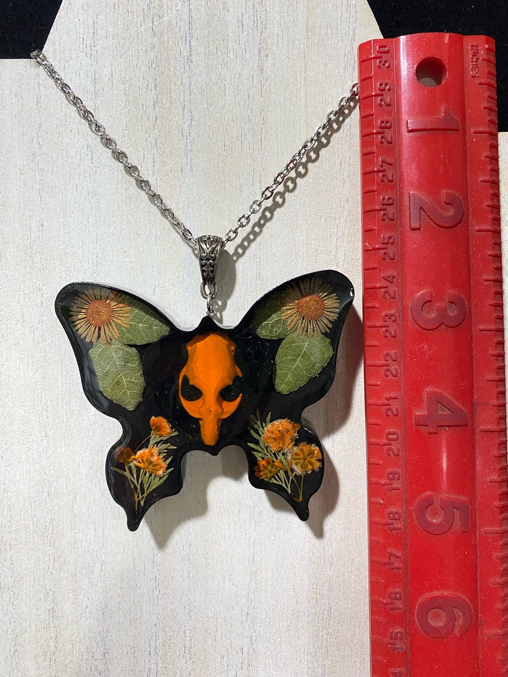 Orange Floral Butterfly Skull Pendant 