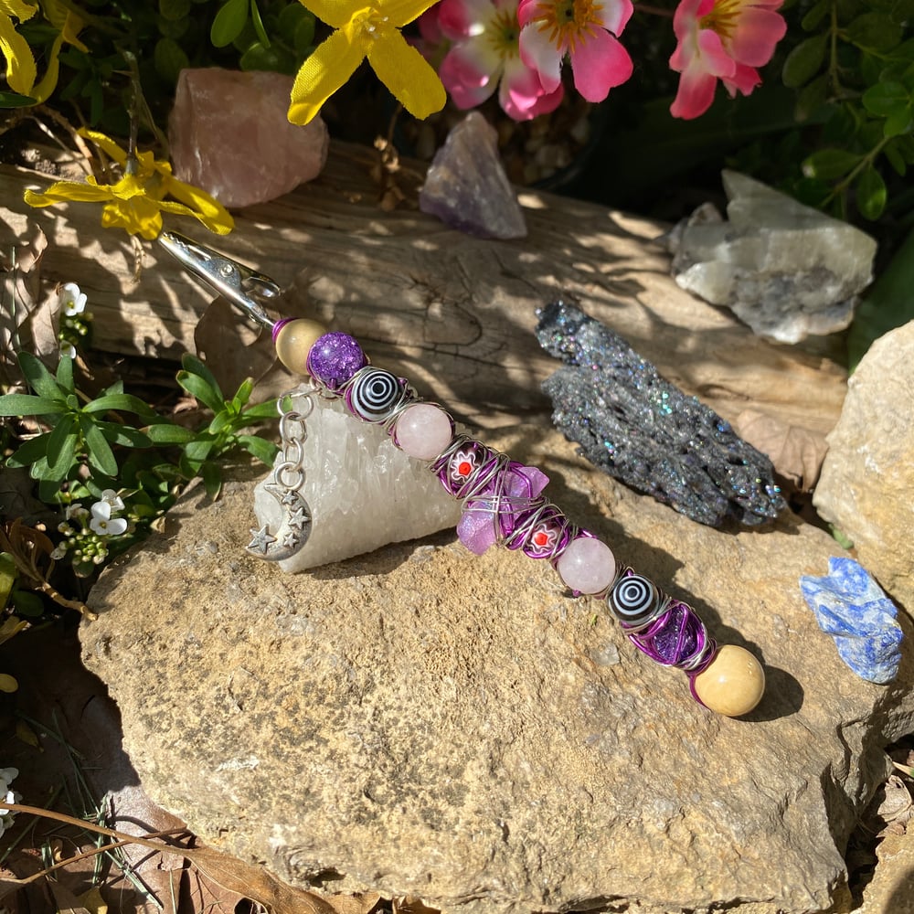 Image of purple haze roach clip