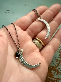 Image 4 of sterling silver moon pendant with brave inscription and green tourmaline