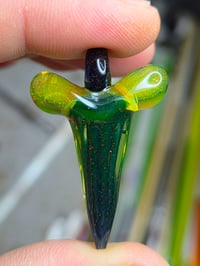 Image 3 of Fully uv reactive crushed opal glass shark tooth pendant. 