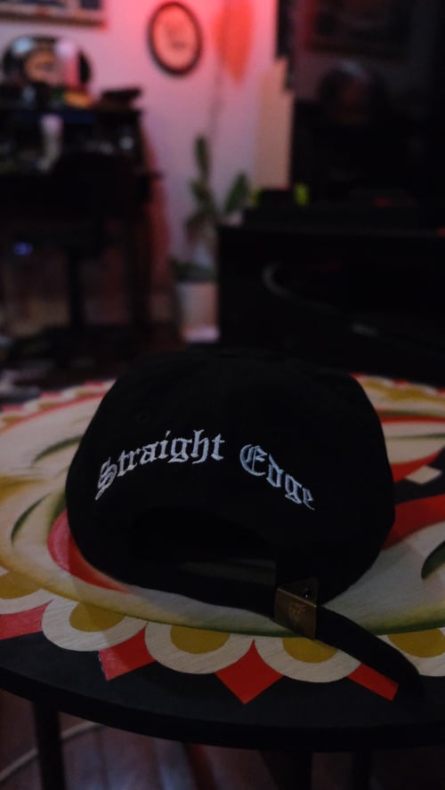 Image of Straight edge hat. 