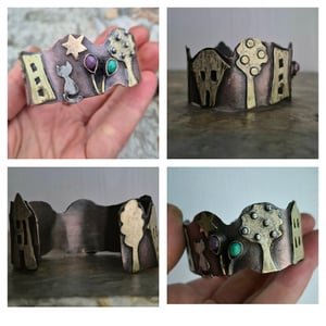 Copper bracelet with trees, houses, cat and star