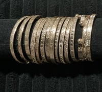Assorted gold bangles