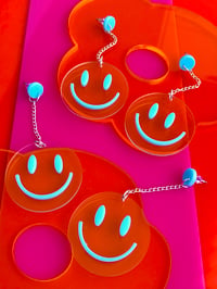 Image 1 of CLEAR SMILEY EARRINGS 
