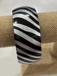 silver and black bangle 