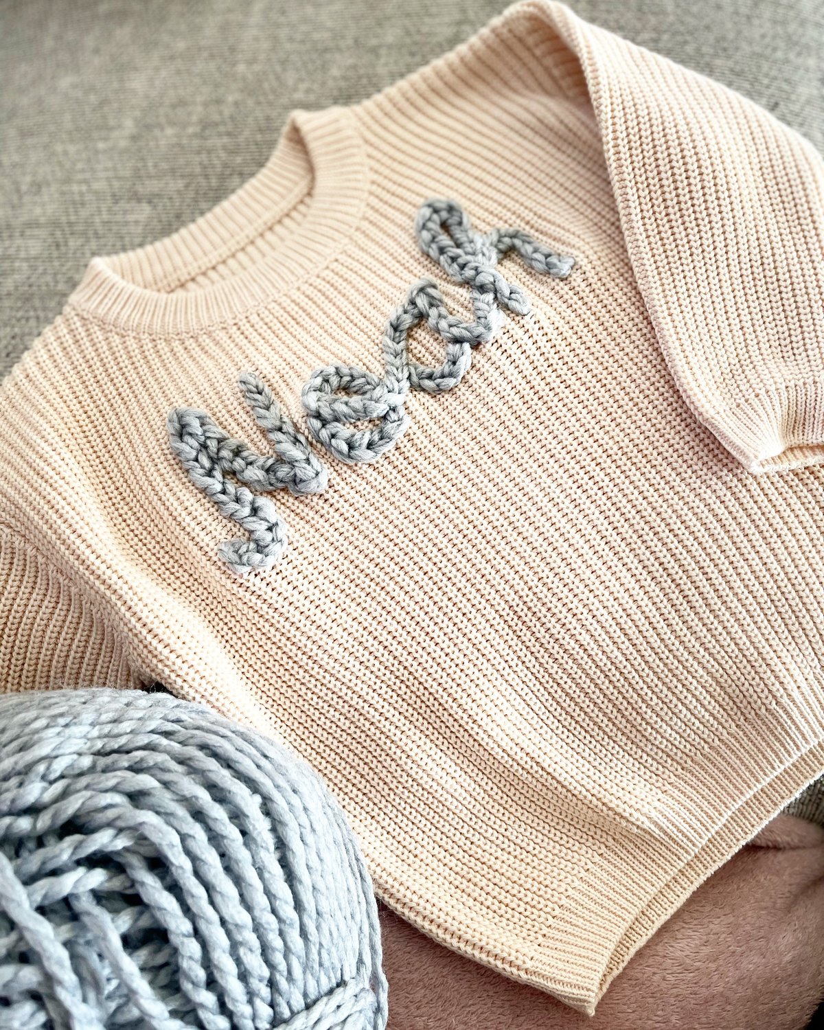 Image of Neutral embroidered jumper 