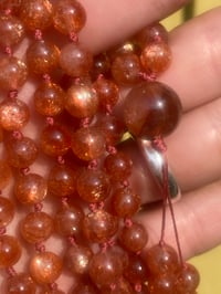 Image 1 of Sunstone Mala with Fire Quartz Guru Bead, Oligoclaise Sunstone 108 Bead Hand Knotted Gemstone Mala