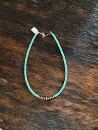 Kingman Heishi/ Saucer Center