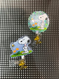 Image 1 of snoopy badge reels