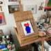 Image of Red Blooms, Blue Pot