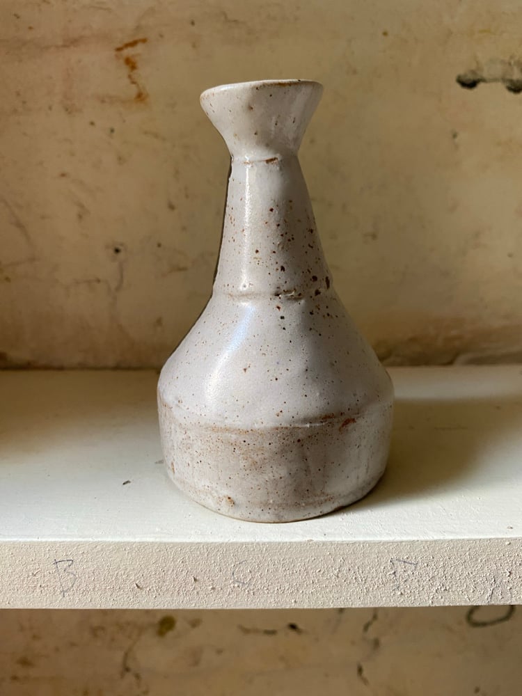 Squat tin glazed bottle with beauty mark Image 2