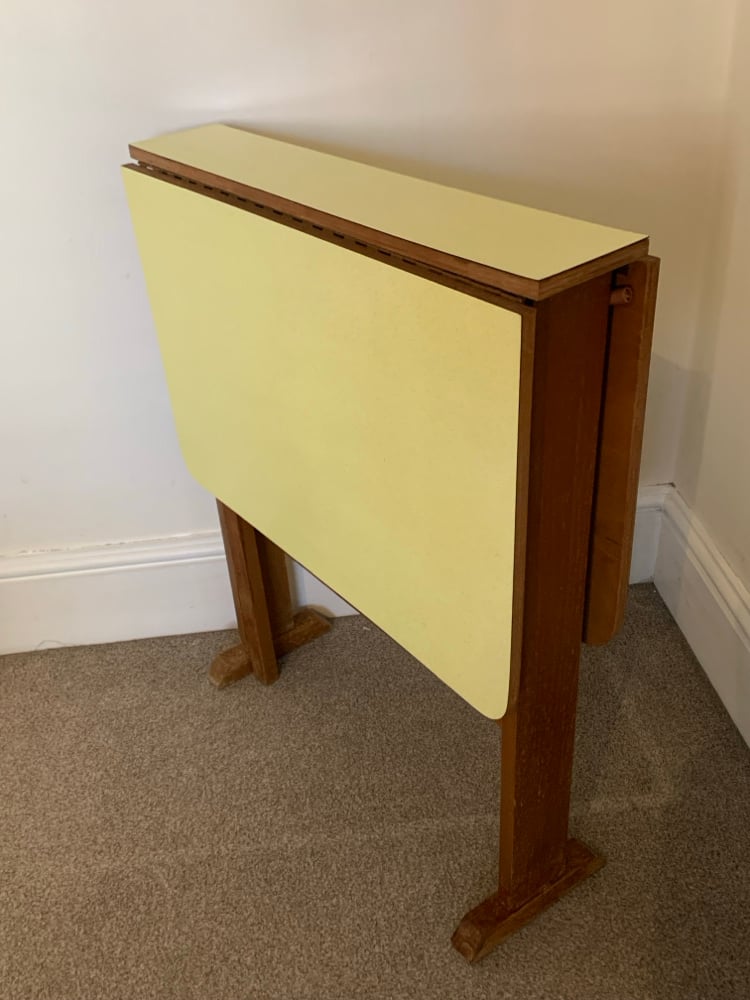 Image of Dropleaf Yellow Formica Table