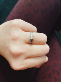 Image 1 of white sapphire ring with paisley band