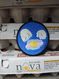 Cracked trans egg iron on patch