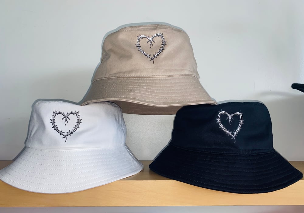 Image of KAROL G BARBWIRE HEART BUCKET HAT - SOLID COLORS 