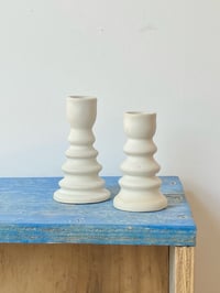 Image 1 of Pair of White Candlestick Holders