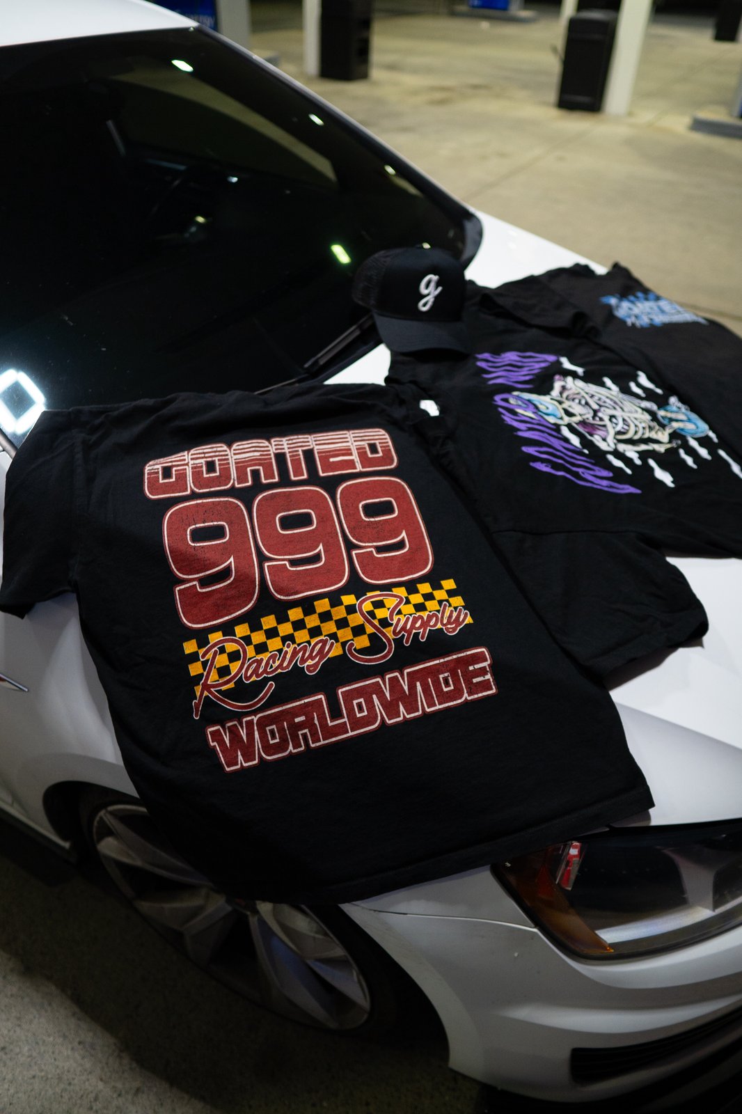Racing WRLD” Tee | Goated Mob Racing Supply