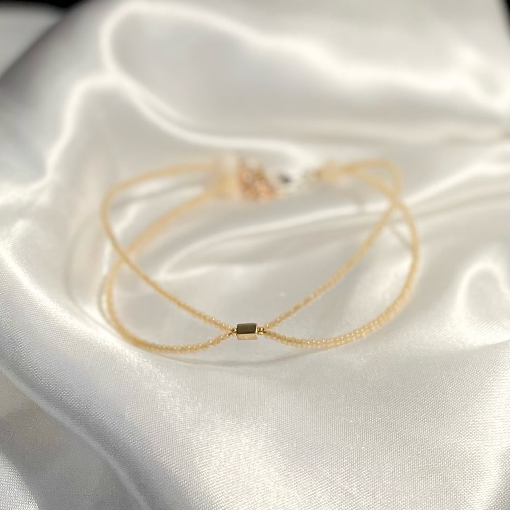 Gilded Ivory Anklet Set