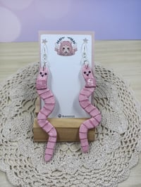 Image 1 of LONG wormy