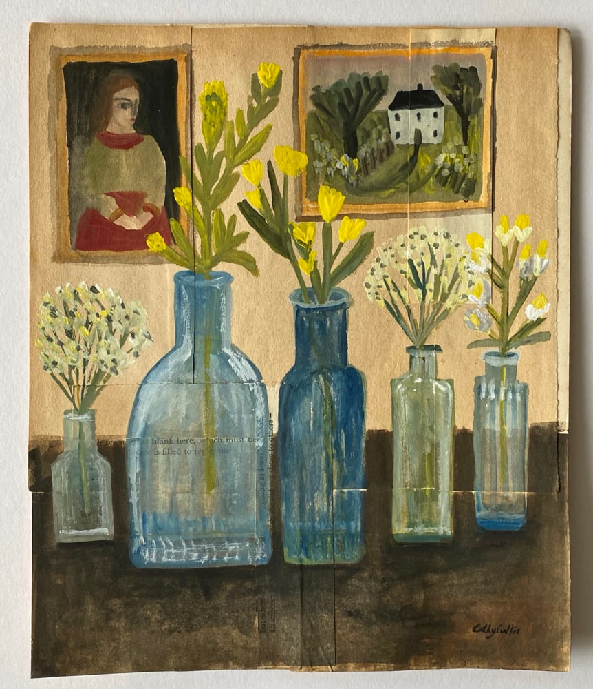 Image of a collection of bottles and wild stems