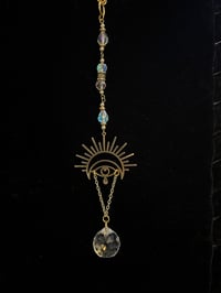 EYES RISING CAR CHARM - gold